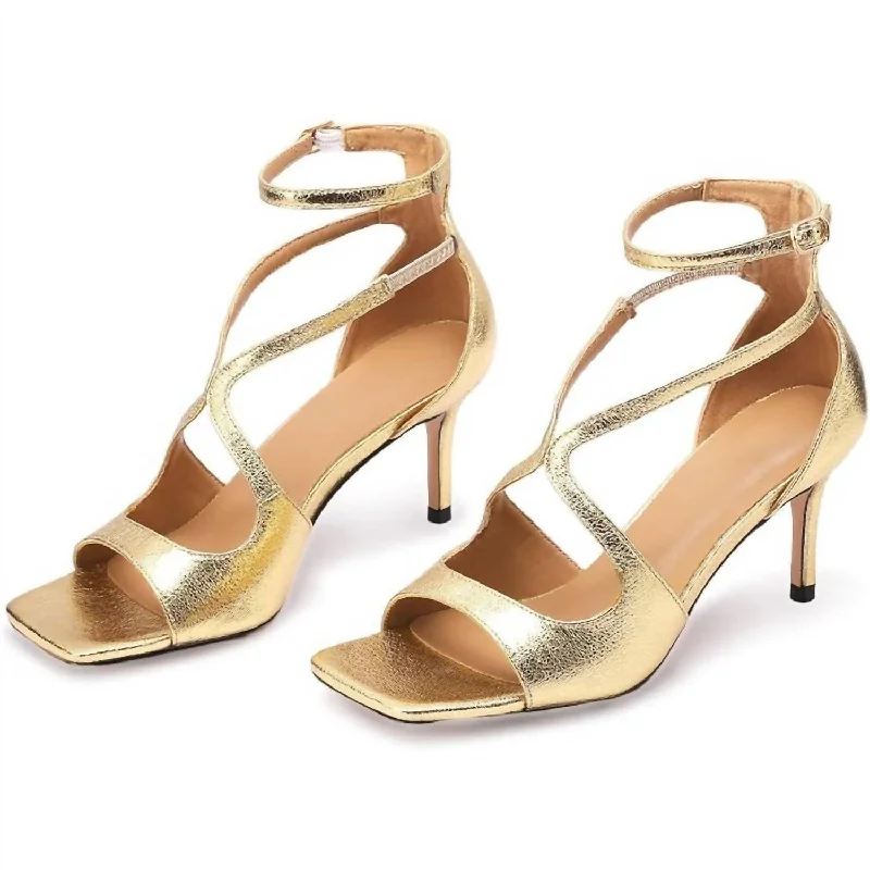 Women's teal stiletto heel pumps for a unique and modern lookWomen's Sexy Strappy Dress Sandals In Gold