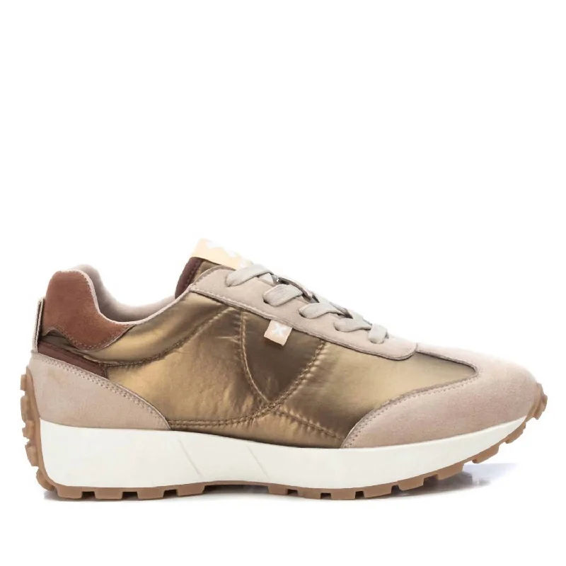 Women's Sneakers with Hidden Wedges for a Subtle Height Boost and Added StyleWomen's Lace-Up Sneakers In Gold